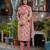 Beautiful jaipuri a pink and white printed indian kurta set with a matching dupatta and pants.