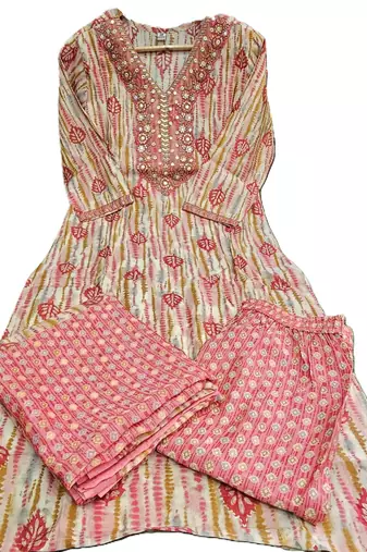 Beautiful jaipuri a pink and white printed indian kurta set with a matching dupatta and pants