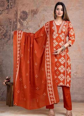 Beautiful jaipuri a rust orange cotton kurta, pant, and dupatta set with floral applique designs and orange piping 1