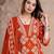 Beautiful jaipuri a rust orange cotton kurta, pant, and dupatta set with floral applique designs and orange piping.