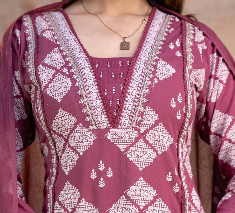 Beautiful jaipuri a magenta-colored women's ethnic wear kurta set with a geometric print.