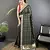 dark green vichitra silk blend bandhej bandhani with stone & sequence work saree