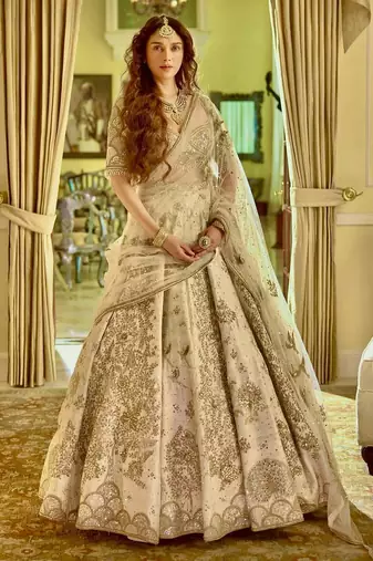 Cream Silk Lehenga with Sequins Dori & Zari Lehenga blouse with Net Dupatta