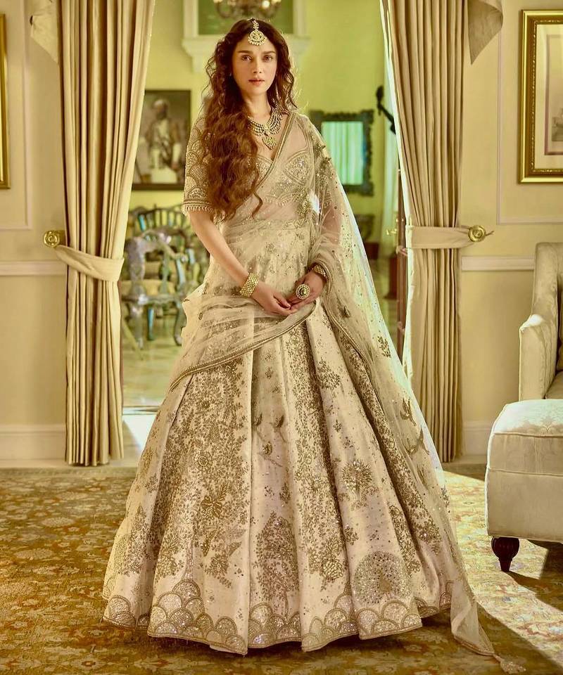 Cream Silk Lehenga with Sequins Dori & Zari Lehenga blouse with Net Dupatta