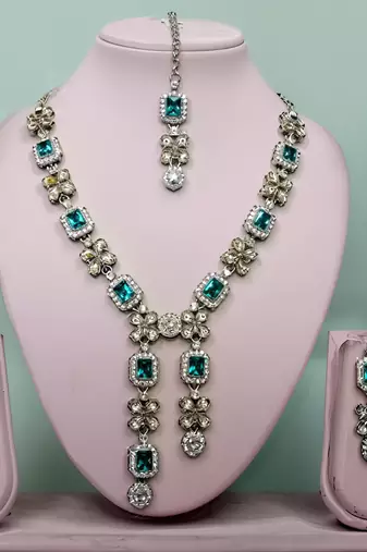 Elegant crystal floral Necklace :: set with earrings  designer party wear jewelry