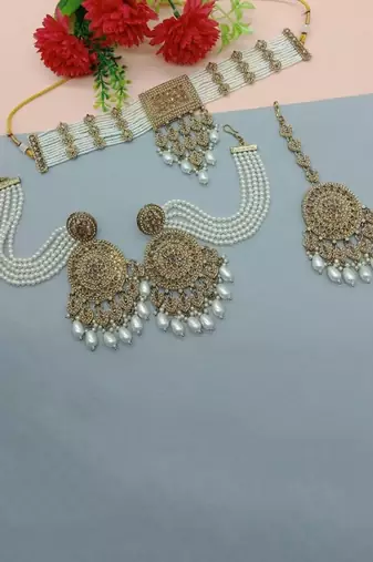Traditional ethnic antique gold-plated pearl bridal choker set with earrings, maang tikka
