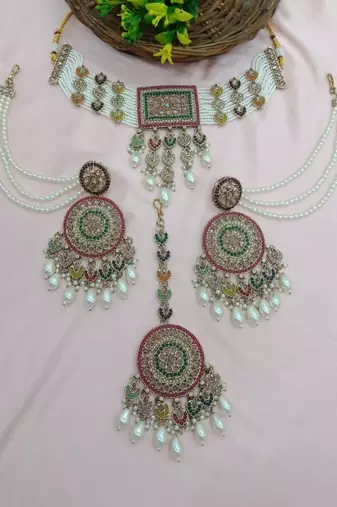 Traditional ethnic antique gold-plated pearl bridal choker set with earrings, maang tikka