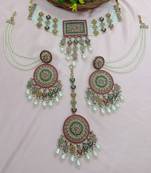 Traditional ethnic antique gold-plated pearl bridal choker set with earrings, maang tikka
