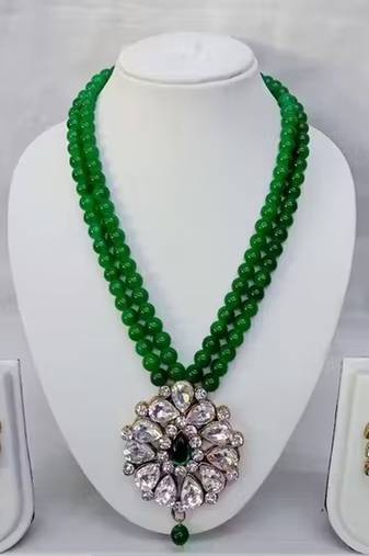 Traditional  handcrafted ethnic green beaded  necklace set  with gold-plated finish &  studded stones  