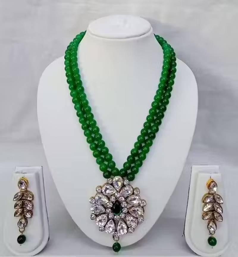 Traditional  handcrafted ethnic green beaded  necklace set  with gold-plated finish &  studded stones  
