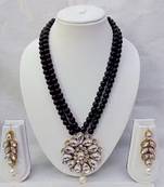 Traditional  handcrafted ethnic black beaded  necklace set  with gold-plated finish &  studded stones  