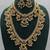 Gold-plated kundan bridal necklace set with long haram & earrings  