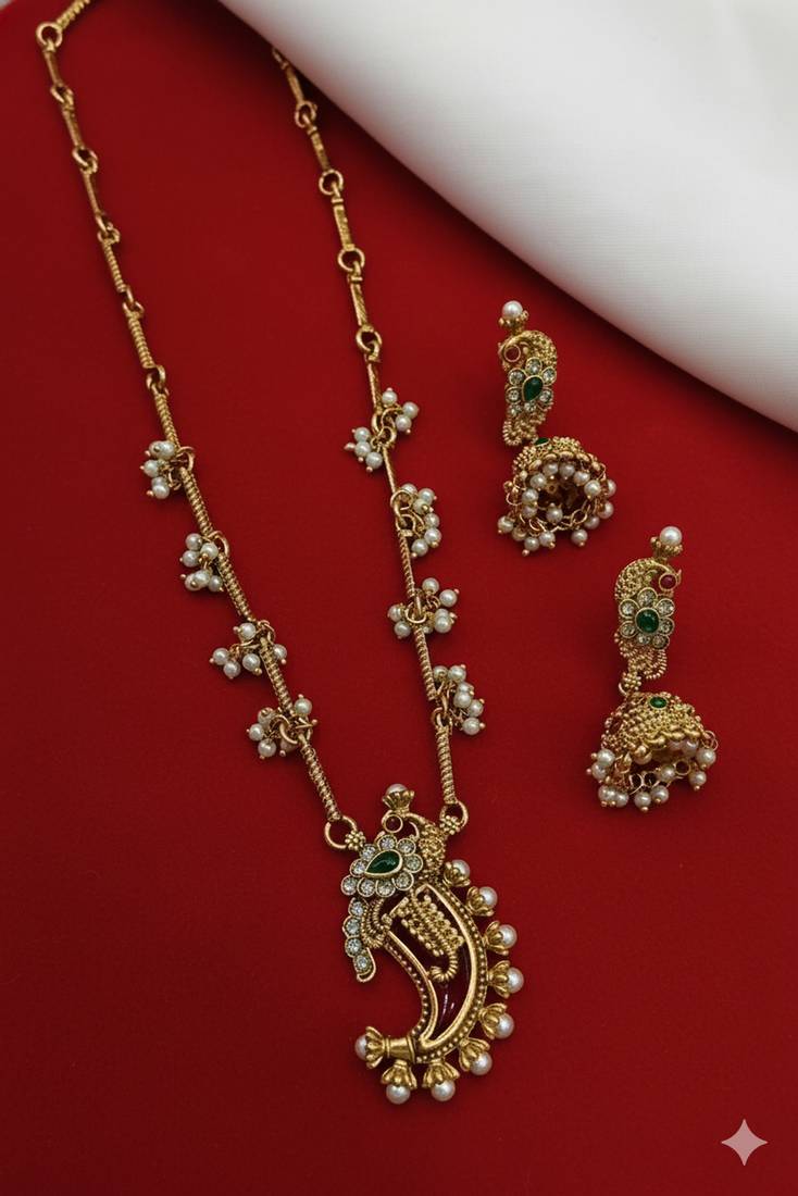 Traditional temple gold-plated peacock necklace set with pearls & jhumka earrings