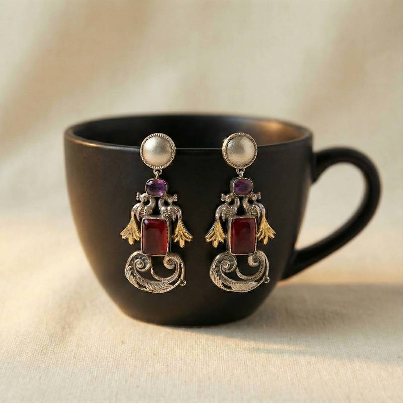 Red color oxidised earrings showcasing vibrant dual-tone shine ideal for festive traditional styling