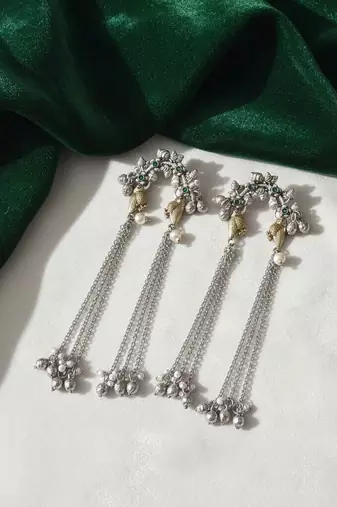 Green color oxidised earrings crafted with dual-tone finish enhancing timeless ethnic sophistication