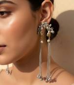 Rani & green color oxidised earrings highlighting contrasting dual-tone hues for festive grandeur