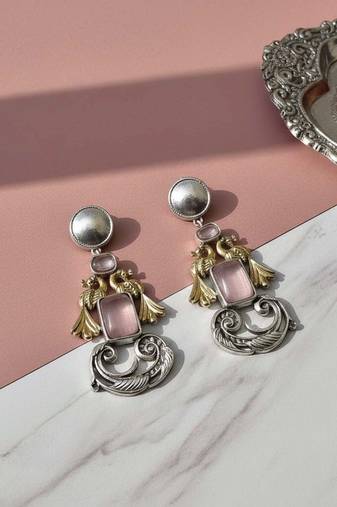 Light pink color oxidised earrings featuring delicate dual-tone craftsmanship for charming ethnic appeal