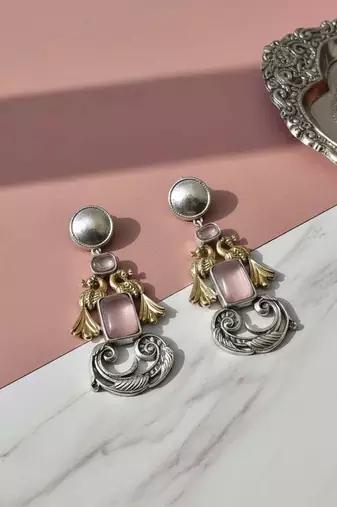 Light pink color oxidised earrings featuring delicate dual-tone craftsmanship for charming ethnic appeal