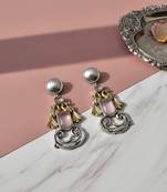 Light pink color oxidised earrings featuring delicate dual-tone craftsmanship for charming ethnic appeal