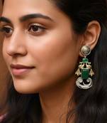 Green color oxidised earrings made in dual-tone artistry perfect for cultural celebration outfits