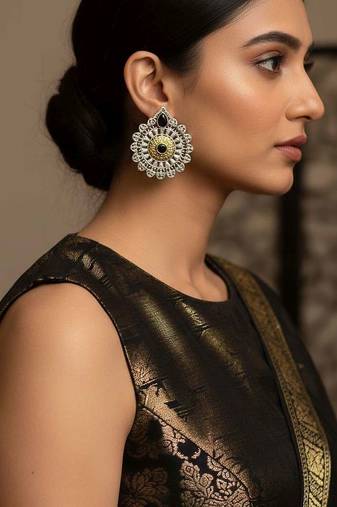 Black color oxidised earrings created with expressive dual-tone depth for strong cultural styling