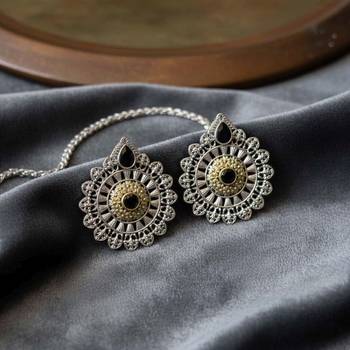 Black color oxidised earrings created with expressive dual-tone depth for strong cultural styling 2