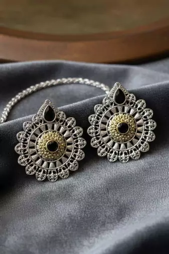 Black color oxidised earrings created with expressive dual-tone depth for strong cultural styling