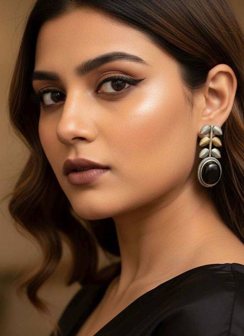 Black color oxidised earrings offering dual-tone vibrance suited for bold ethnic expression
