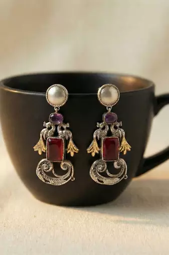 Red color oxidised earrings showcasing vibrant dual-tone shine ideal for festive traditional styling