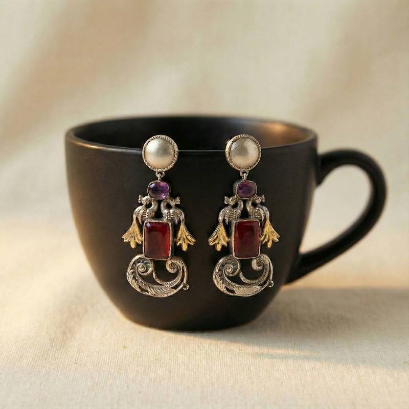 Red color oxidised earrings showcasing vibrant dual-tone shine ideal for festive traditional styling