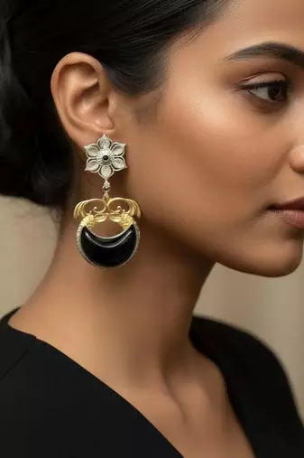 Black color oxidised earrings featuring detailed dual-tone metalwork ideal for striking ethnic fashion