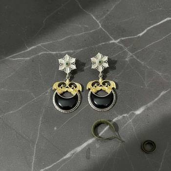 Black color oxidised earrings featuring detailed dual-tone metalwork ideal for striking ethnic fashion 2