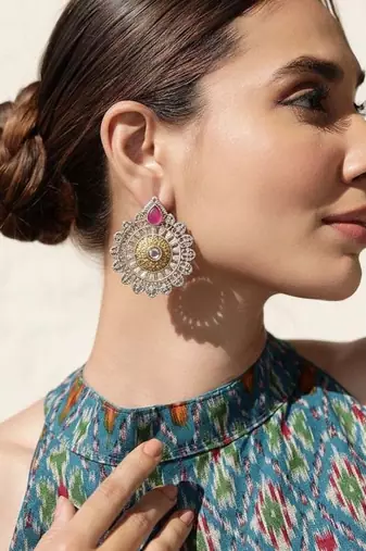 Rani color oxidised earrings made with dual-tone finish ideal for elegant ethnic celebrations