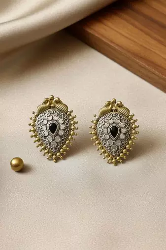 Black color oxidised earrings crafted with antique dual-tone finish for heritage-inspired styling