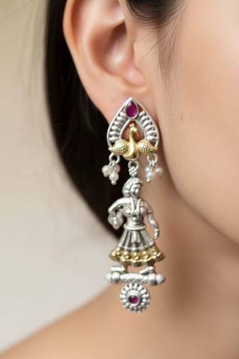 Rani color oxidised earrings featuring beautiful dual-tone patterns suited for festive celebrations