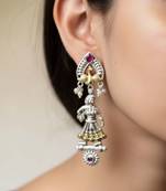 Rani color oxidised earrings featuring beautiful dual-tone patterns suited for festive celebrations