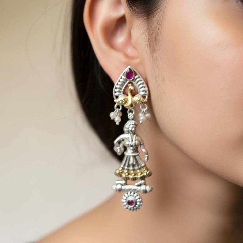 Rani color oxidised earrings featuring beautiful dual-tone patterns suited for festive celebrations