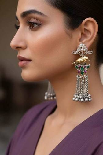 Rani & green color oxidised earrings offering dual-tone contrast ideal for bold cultural fashion