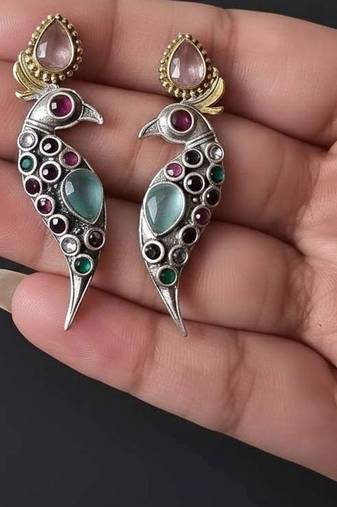 Multi color oxidised earrings blended with artistic dual-tone finishes for expressive festive styling