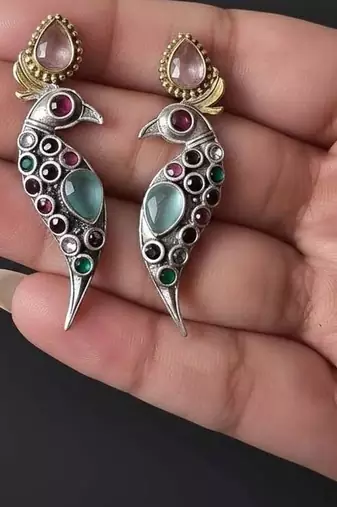 Multi color oxidised earrings blended with artistic dual-tone finishes for expressive festive styling