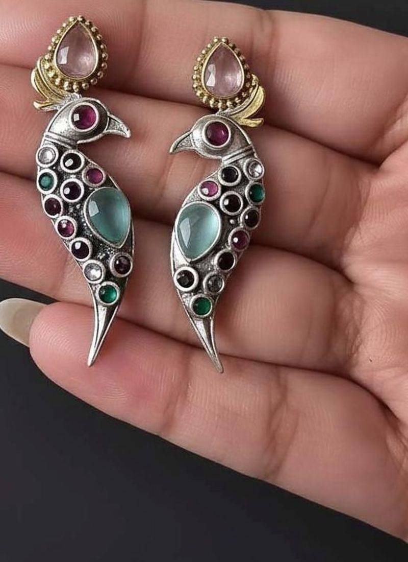 Multi color oxidised earrings blended with artistic dual-tone finishes for expressive festive styling