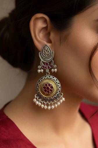 Pink color oxidised earrings made with distinctive dual-tone detailing for charming festive appeal