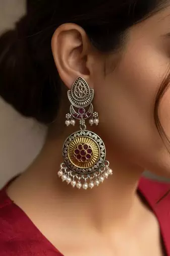 Pink color oxidised earrings made with distinctive dual-tone detailing for charming festive appeal