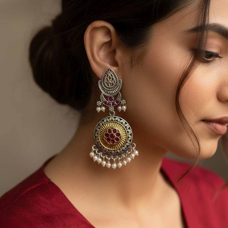 Pink color oxidised earrings made with distinctive dual-tone detailing for charming festive appeal