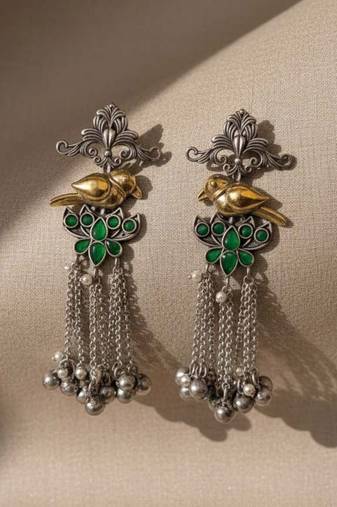 Green color oxidised earrings highlighting dual-tone craftsmanship perfect for festive ethnic moments