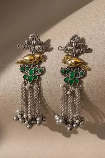 Green color oxidised earrings highlighting dual-tone craftsmanship perfect for festive ethnic moments