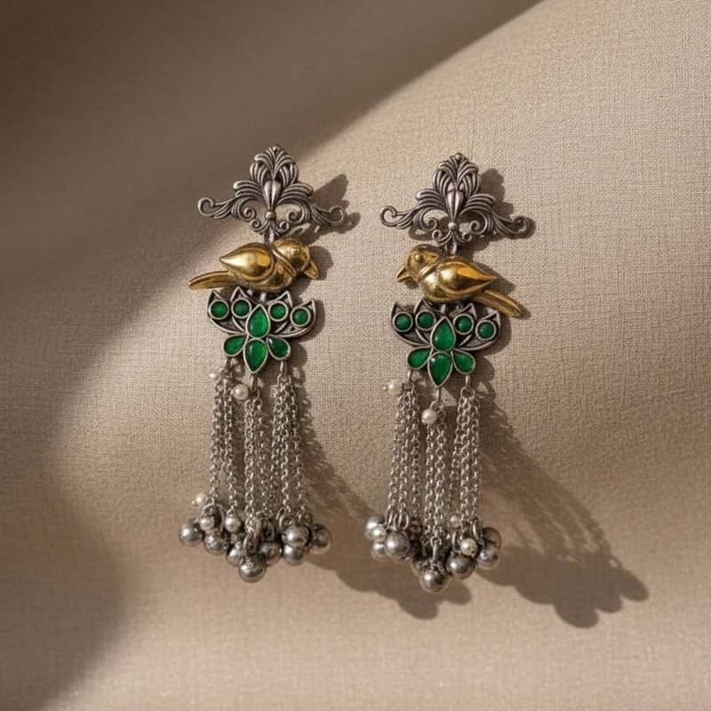 Green color oxidised earrings highlighting dual-tone craftsmanship perfect for festive ethnic moments