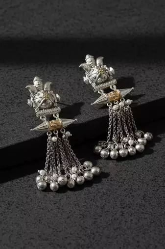 Gold & silver color oxidised earrings showing luxurious dual-tone artistry ideal for celebrations