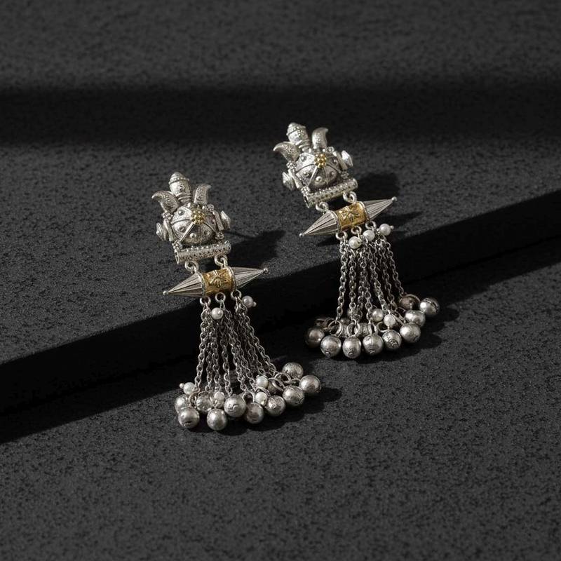 Gold & silver color oxidised earrings showing luxurious dual-tone artistry ideal for celebrations
