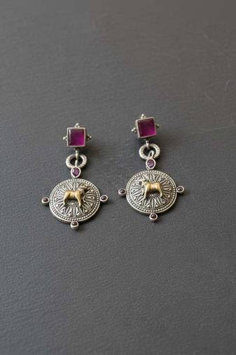 Rani color oxidised earrings crafted with dual-tone patterns for vibrant traditional fashion flair